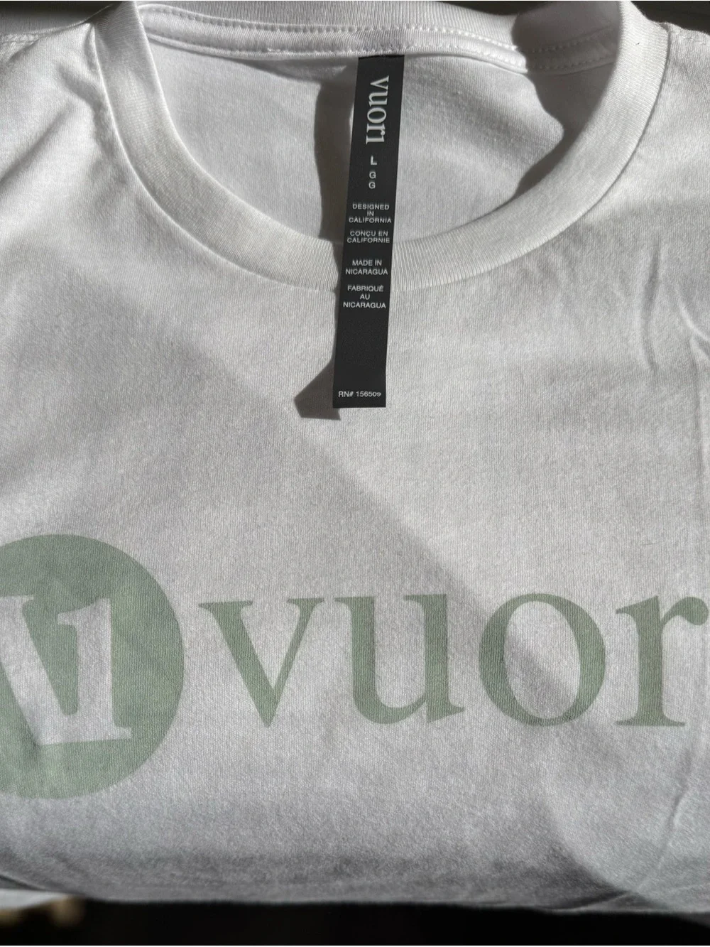 Vuori White Tee with Mint Green Logo - Picture 2 of 4